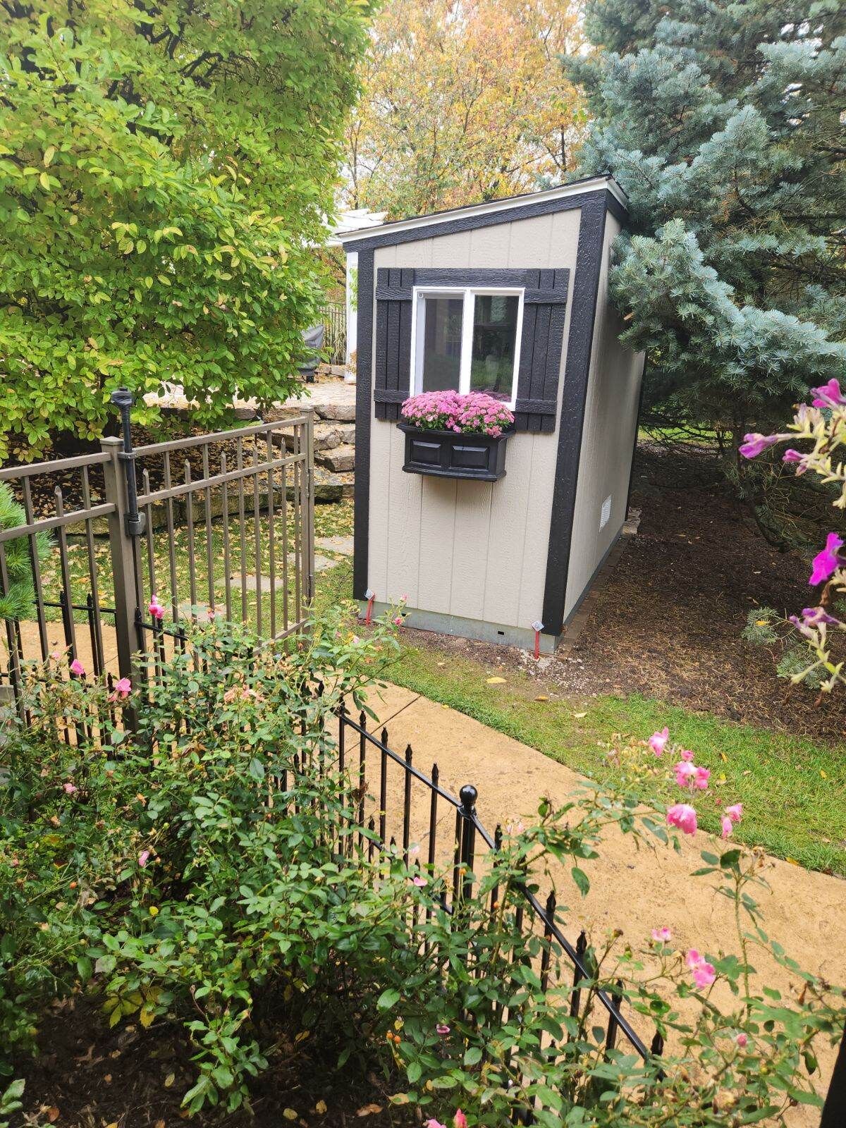 A lean-to featuring a window box